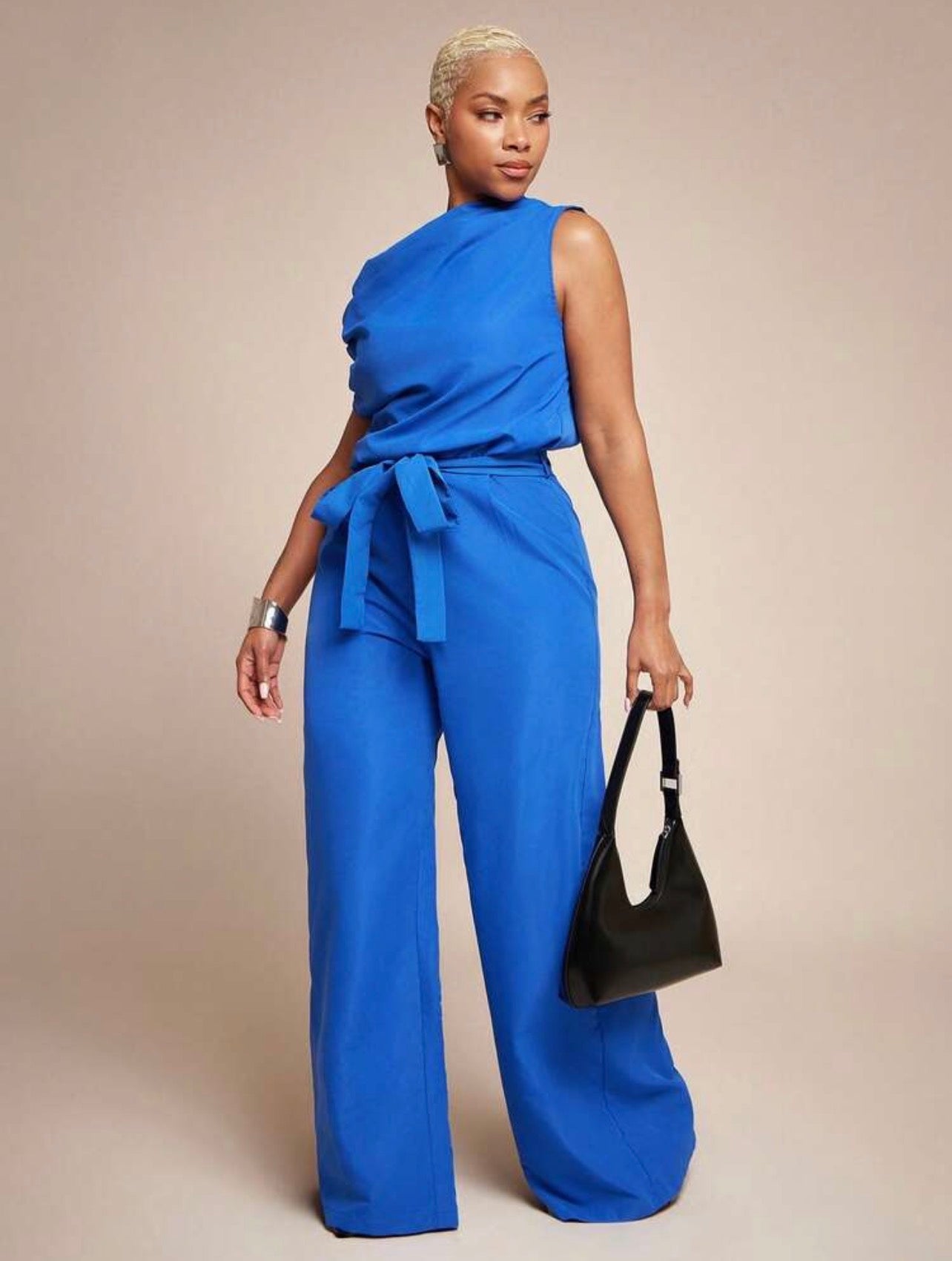 Vixey Woven Asymmetrical Draped Neckline Keyhole Back Self Belt Flare Leg Jumpsuit