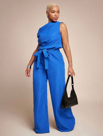 Vixey Woven Asymmetrical Draped Neckline Keyhole Back Self Belt Flare Leg Jumpsuit