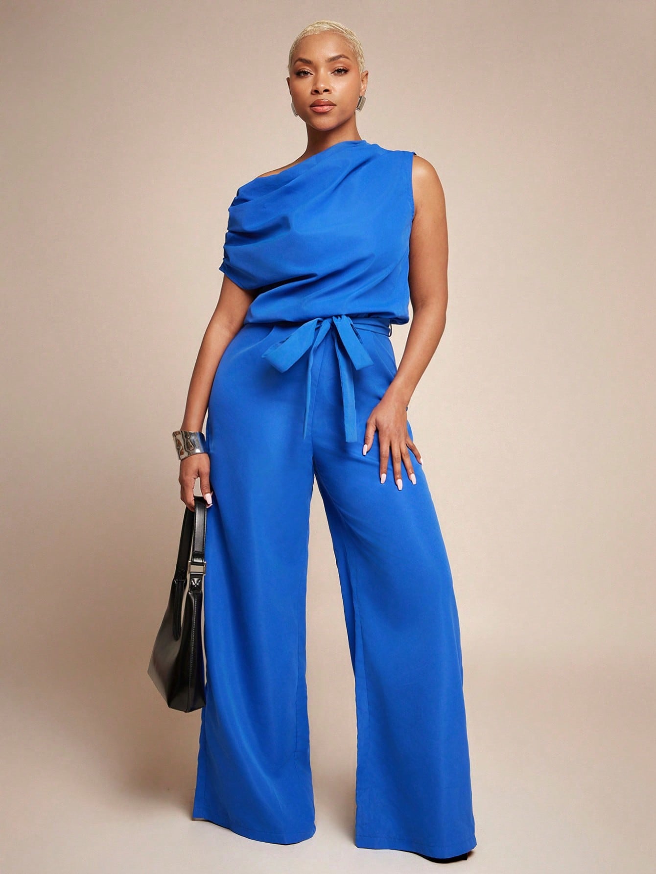 Vixey Woven Asymmetrical Draped Neckline Keyhole Back Self Belt Flare Leg Jumpsuit